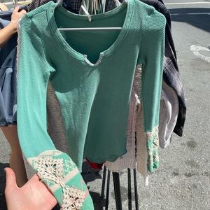 Free people long sleeve. Very comfortable and flattering.